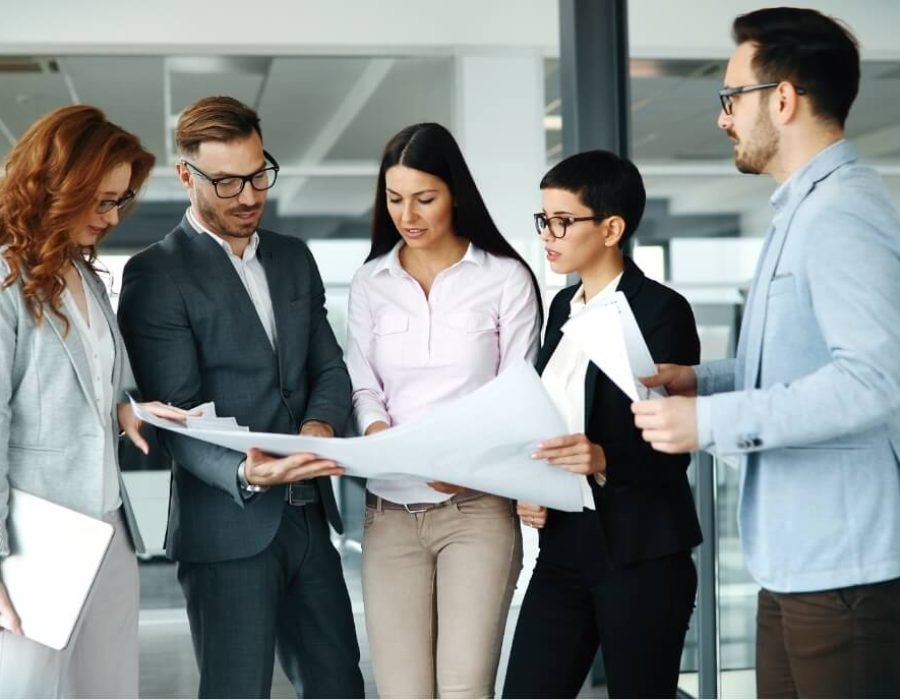 Corporate Teamworking Colleagues In Modern Office